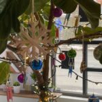 Ornaments hanging on fig tree